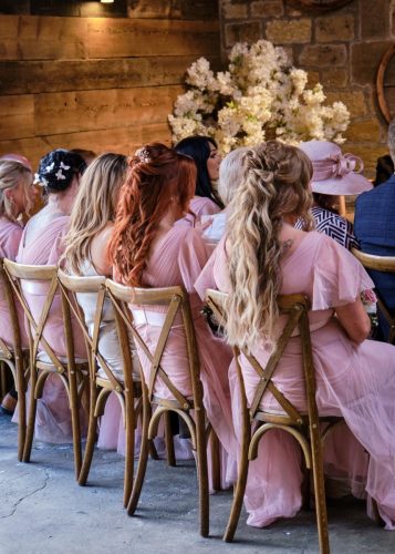 bridesmaids sitting patiently 